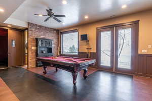 Rec room with plenty of natural light, ceiling fan, a textured ceiling, and pool table