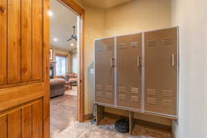 Mudroom featuring ceiling fan and light hardwood / wood-style floors