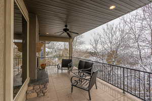 Balcony featuring ceiling fan