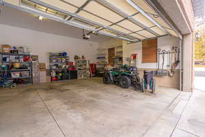 Garage featuring a garage door opener