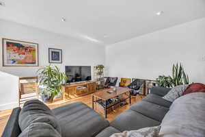 Living room featuring hardwood / wood-style floors