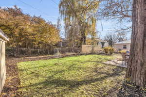 View of yard with a patio area