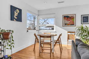 Dining area featuring hardwood / wood-style flooring