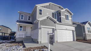 View of front facade with a garage