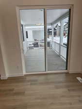 Empty room featuring wood-type flooring