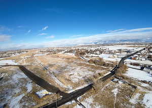 Snowy aerial view with a mountain view