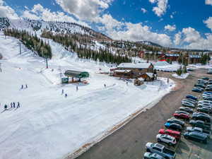 Snowy aerial view with a mountain view