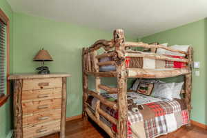 Bedroom featuring hardwood / wood-style flooring