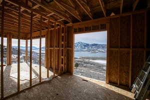 Misc room featuring a wealth of natural light and a mountain view