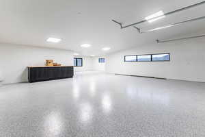 Over sized 3 gar garage with 220 outlet, a shop and masive storage.