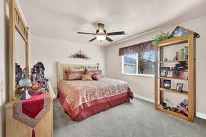 Bedroom with carpet flooring and ceiling fan