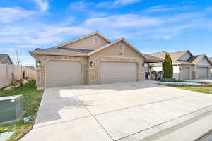 Ranch-style home with a garage