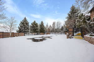 View of yard layered in snow