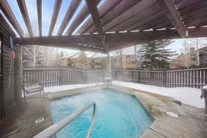 View of swimming pool featuring a pergola