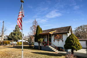 View of front of home featuring a front lawn