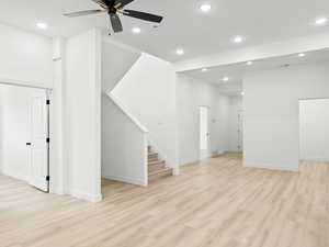 Interior space featuring light wood-type flooring and ceiling fan