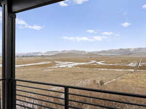 View of mountain feature with a rural view