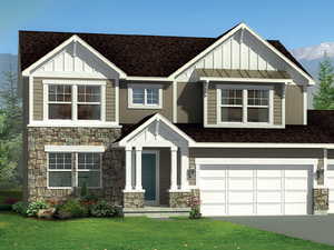 View of front facade with a mountain view, a front yard, and a garage