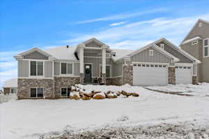 Craftsman inspired home with a garage