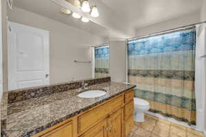 Bathroom with vanity and toilet