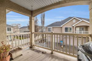 Balcony featuring area for grilling