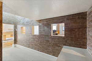 Bathroom with a textured ceiling