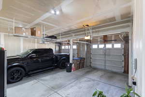 Garage featuring a garage door opener