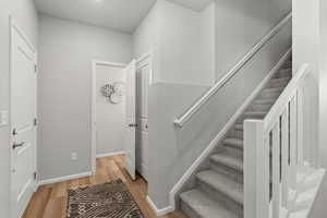 Stairway with wood-type flooring