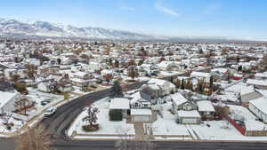 Snowy aerial view with a mountain view