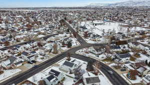 Snowy aerial view with a mountain view