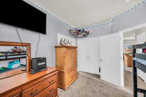 View of carpeted bedroom