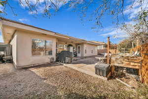 Back of property featuring a patio