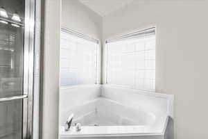 Bathroom with a tub to relax in