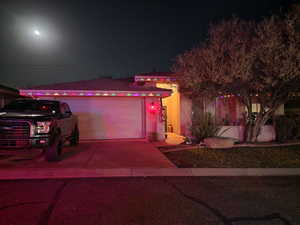 View of front of property with a garage