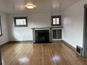 Living Room showing glass front cabinet for your display items