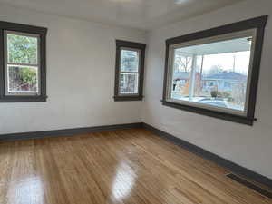 Dining room featuring a healthy amount of sunlight and light hardwood floors