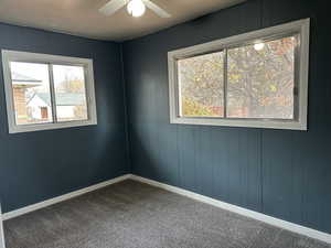 Bedroom 2 had 2 large slider windows and a ceiling fan