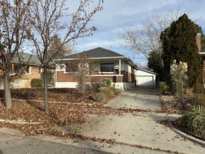 Front of property  showing the garage in the back