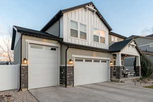 View of front of property with a garage