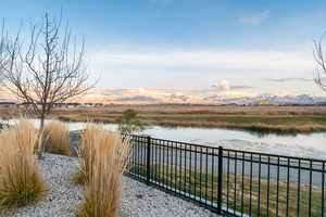 View of water feature with a mountain view