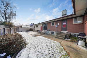 Back of property featuring a patio area
