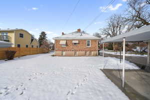 View of snow covered property