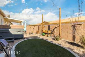 View of yard featuring a hot tub