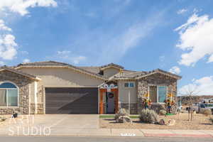 View of front of property with a garage