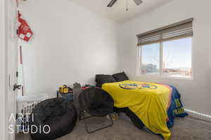 Bedroom featuring carpet floors and ceiling fan