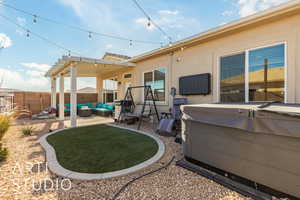 Back of property with outdoor lounge area and a patio