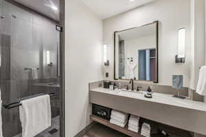 Bathroom with vanity and walk in shower