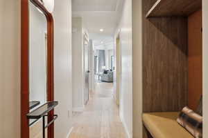 Hallway with light wood-type flooring