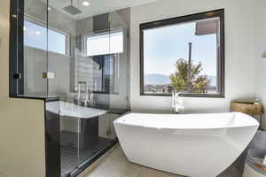 Owner's bathroom suite complete with an oversized shower, soaking tub and large vanity area.