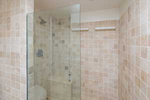 Bathroom with an enclosed shower